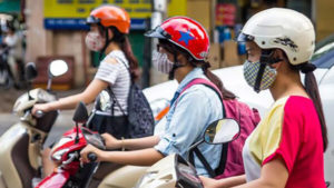 bikers in vietnam with masks